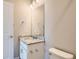 Bathroom with modern lighting, granite counters, and a vanity at 2560 Lupton Ln, Lafayette, CO 80026