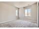Neutral bedroom featuring plush carpeting and sunny windows offering light at 2560 Lupton Ln, Lafayette, CO 80026