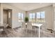 Bright dining room with large windows providing scenic neighborhood views at 2560 Lupton Ln, Lafayette, CO 80026