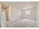 Open loft featuring neutral walls, carpet, and lots of natural light at 2560 Lupton Ln, Lafayette, CO 80026