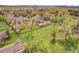 Aerial view of property showing the expansive lot size, mature trees, and neighborhood at 3970 Pierson St, Wheat Ridge, CO 80033