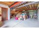 Unfinished basement space for storage, utilities, and potential customization at 3970 Pierson St, Wheat Ridge, CO 80033