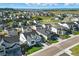 A vibrant neighborhood showcasing well-maintained homes, green spaces, and scenic views of the surrounding landscape at 6456 Kenzie Cir, Castle Pines, CO 80108
