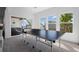 Recreation area featuring a sleek black Prince ping pong table and a sliding door leading to an outdoor patio at 6456 Kenzie Cir, Castle Pines, CO 80108