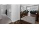 Hallway with hardwood floors that connects different areas of the home at 6456 Kenzie Cir, Castle Pines, CO 80108