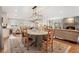 Spacious dining area with ample seating perfect for entertaining, open to kitchen and living at 2588 S Flower Ct, Lakewood, CO 80227