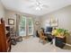 This office features a ceiling fan, natural lighting, and space for creativity at 2588 S Flower Ct, Lakewood, CO 80227