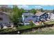 Enjoy neighborhood living with a manicured lawn and relaxing deck space at 13464 Vine St, Thornton, CO 80241