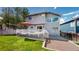 This home features a charming backyard with a lovely deck perfect for outdoor entertaining at 13464 Vine St, Thornton, CO 80241