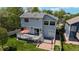 This home has a beautiful backyard with a spacious deck and patio area at 13464 Vine St, Thornton, CO 80241