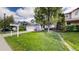 Well-maintained home with a lush front lawn and a 'Coming Soon' sign, offering a promising new beginning at 13464 Vine St, Thornton, CO 80241