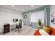Bright office space with a window, desk, comfortable chair and modern decor at 13464 Vine St, Thornton, CO 80241