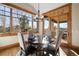 Cozy dining area with mountain views features a round table and four chairs at 1052 Country Club Estates Dr, Castle Rock, CO 80108