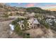 Luxury home on a large lot, surrounded by trees and mountain views at 1052 Country Club Estates Dr, Castle Rock, CO 80108