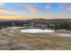 Scenic golf course views feature ponds and lush landscaping at 1052 Country Club Estates Dr, Castle Rock, CO 80108