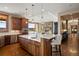 Modern kitchen with a large island, custom cabinetry, and an open layout perfect for entertaining and everyday living at 1052 Country Club Estates Dr, Castle Rock, CO 80108
