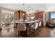 Gourmet kitchen with a large island, custom cabinetry, and stainless steel appliances, perfect for culinary enthusiasts at 1052 Country Club Estates Dr, Castle Rock, CO 80108