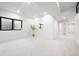 Finished basement with a large window and recessed lighting at 19 Washington Ave, Golden, CO 80403