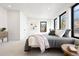 Bright bedroom featuring large windows, plush bedding, and modern decor at 19 Washington Ave, Golden, CO 80403