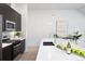 Contemporary kitchen with dark cabinetry and a large island at 19 Washington Ave, Golden, CO 80403