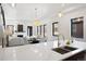 Bright and spacious living area featuring white walls, modern fireplace and open floor plan at 19 Washington Ave, Golden, CO 80403