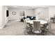 Spacious finished basement featuring a comfortable living space and a dining area at 6530 Barnstead Dr, Castle Pines, CO 80108