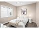 Comfortable bedroom featuring a neutral color scheme, plush bedding, and stylish décor at 6530 Barnstead Dr, Castle Pines, CO 80108