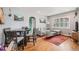 Comfortable living room with a modern sofa, hardwood floors, and an adjacent dining area at 3640 N Saint Paul St, Denver, CO 80205