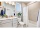 Cozy bathroom featuring modern fixtures, a bathtub with shower, and stylish decor, creating a relaxing atmosphere at 13437 Waterthrush St, Parker, CO 80134
