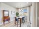 Cozy dining area featuring a dining table, chairs, and natural light from a window at 13437 Waterthrush St, Parker, CO 80134