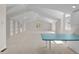 Large bonus room with high ceilings, built-in shelves, and a bright, open layout at 5390 S Boston St, Greenwood Village, CO 80111