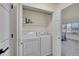 Laundry room with a side by side washer and dryer at 16773 W 61St Ln, Arvada, CO 80403