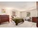 Spacious bedroom with carpet, natural light, and traditional decor at 9540 E Grand Pl, Greenwood Village, CO 80111