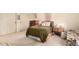 Bedroom featuring neutral carpet, a comfortable bed, and natural light at 9540 E Grand Pl, Greenwood Village, CO 80111