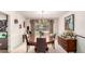 Dining room area featuring modern lighting, hardwood floors, and neutral wall colors at 9540 E Grand Pl, Greenwood Village, CO 80111