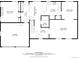 Detailed floor plan showing layout of the first floor: living room, kitchen, and garage at 9540 E Grand Pl, Greenwood Village, CO 80111