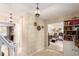 Inviting foyer with tiled floor, decorative wallpaper and neutral wall colors at 9540 E Grand Pl, Greenwood Village, CO 80111