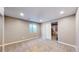 Finished basement with recessed lighting, carpet, and small window at 15926 Butterwort Cir, Parker, CO 80134