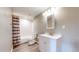 Bright bathroom featuring a vanity, toilet, shower-tub combo with a shower curtain at 15926 Butterwort Cir, Parker, CO 80134