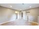 A cozy bedroom features neutral walls, carpet flooring, and a closet with ample storage space at 15926 Butterwort Cir, Parker, CO 80134