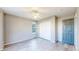 Bedroom with ceiling fan, vinyl flooring, and closet with sliding doors at 15926 Butterwort Cir, Parker, CO 80134