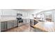 Kitchen with stainless appliances, butcher block countertops and white subway tile at 15926 Butterwort Cir, Parker, CO 80134