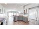 View of open concept floorplan from kitchen showcasing butcher block counters at 15926 Butterwort Cir, Parker, CO 80134