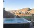 Relaxing hot tub with views of mountains and neighborhood at 10914 W Coco Pl, Littleton, CO 80127