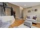 Cozy living room features stylish seating, hardwood floors, and neutral decor at 10914 W Coco Pl, Littleton, CO 80127