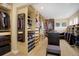 Large walk-in closet featuring custom shelving and storage options at 10914 W Coco Pl, Littleton, CO 80127