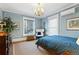 Spacious bedroom with large windows and comfortable seating at 750 N Clarkson St, Denver, CO 80218