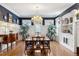 Elegant dining room featuring a crystal chandelier and built-in cabinetry at 750 N Clarkson St, Denver, CO 80218