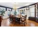 Formal dining room with hardwood floors, built-in cabinetry, and chandelier at 750 N Clarkson St, Denver, CO 80218