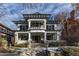 Grand two-story home with classic columns and a welcoming front porch at 750 N Clarkson St, Denver, CO 80218